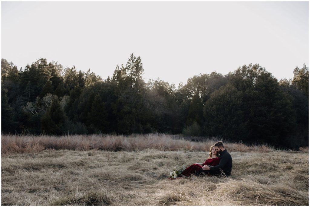 couple sitting in field