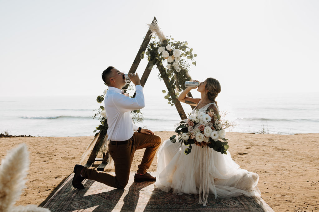 fun wedding photos at sunset cliffs by San Diego wedding photographer pages studio