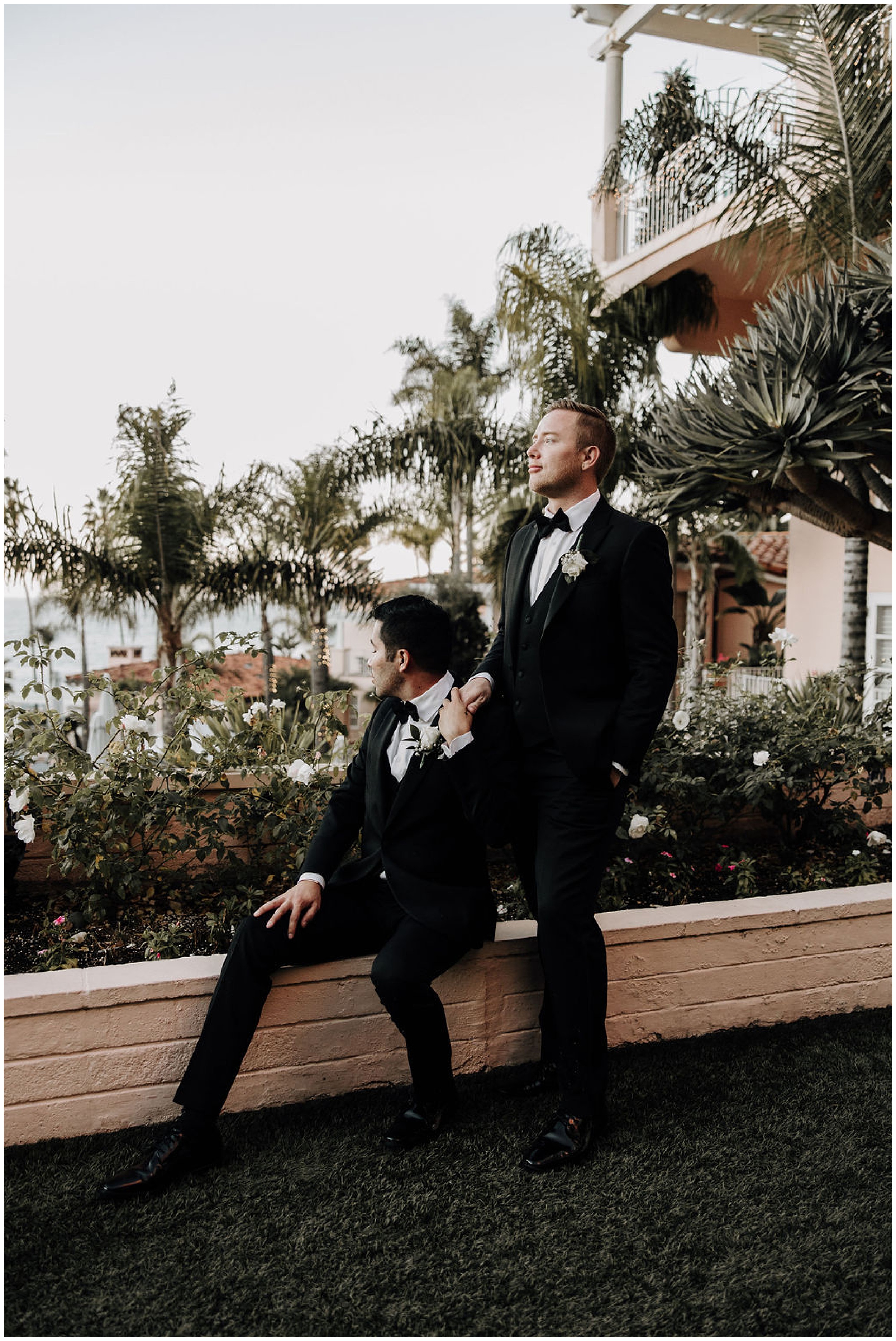 grooms posing together