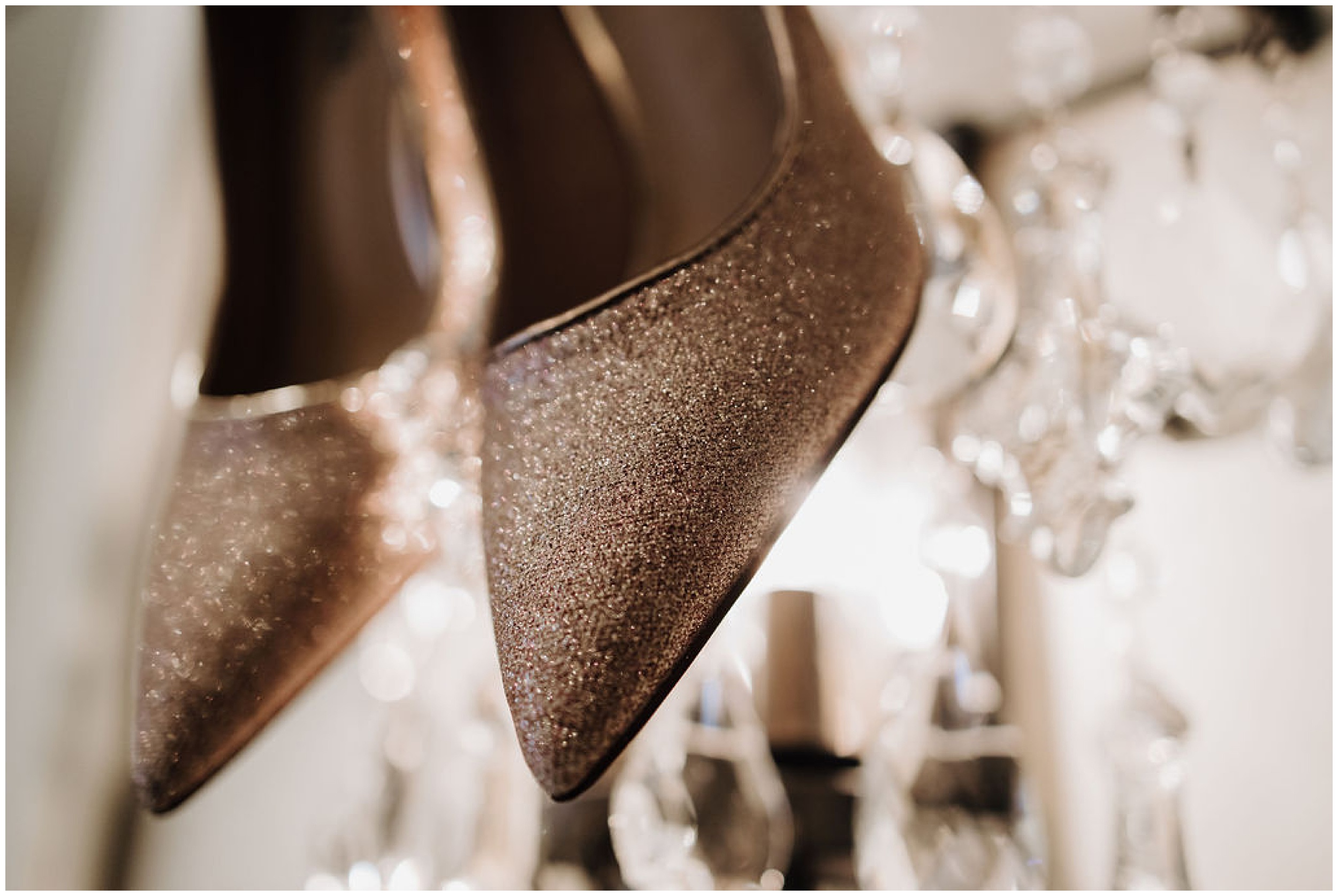 glittery pink wedding shoes hanging